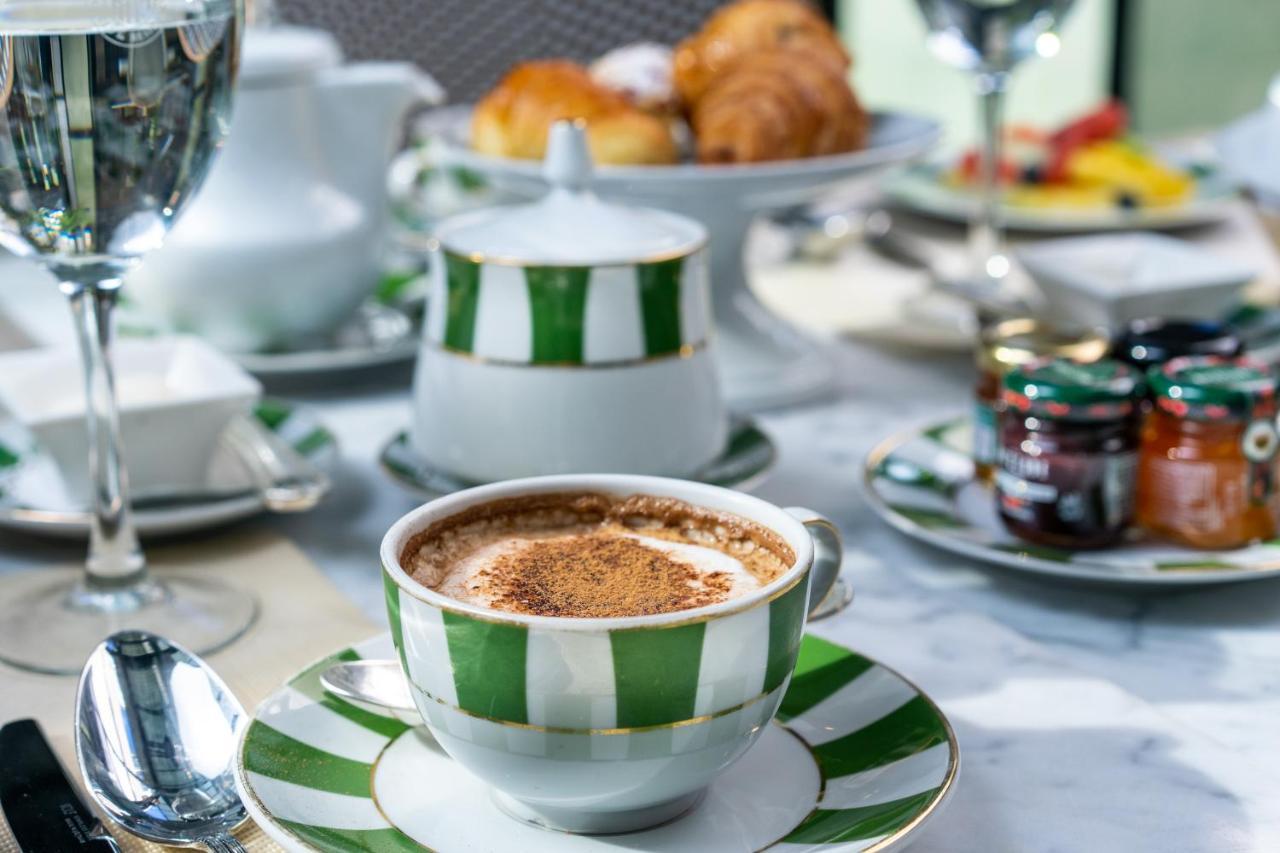 Alvear Icon Hotel 부에노스아이레스 외부 사진 A cup of cappuccino