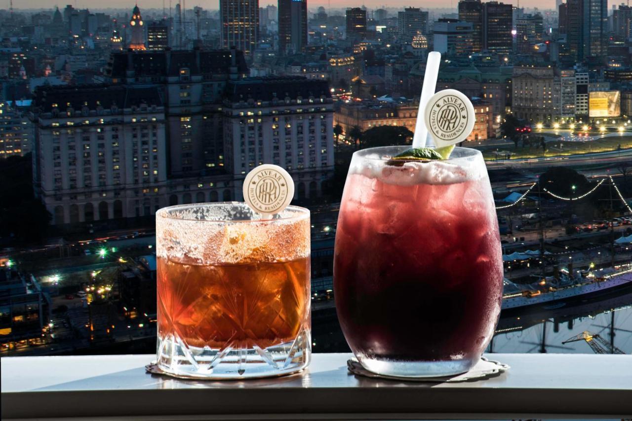 Alvear Icon Hotel 부에노스아이레스 외부 사진 Two cocktails